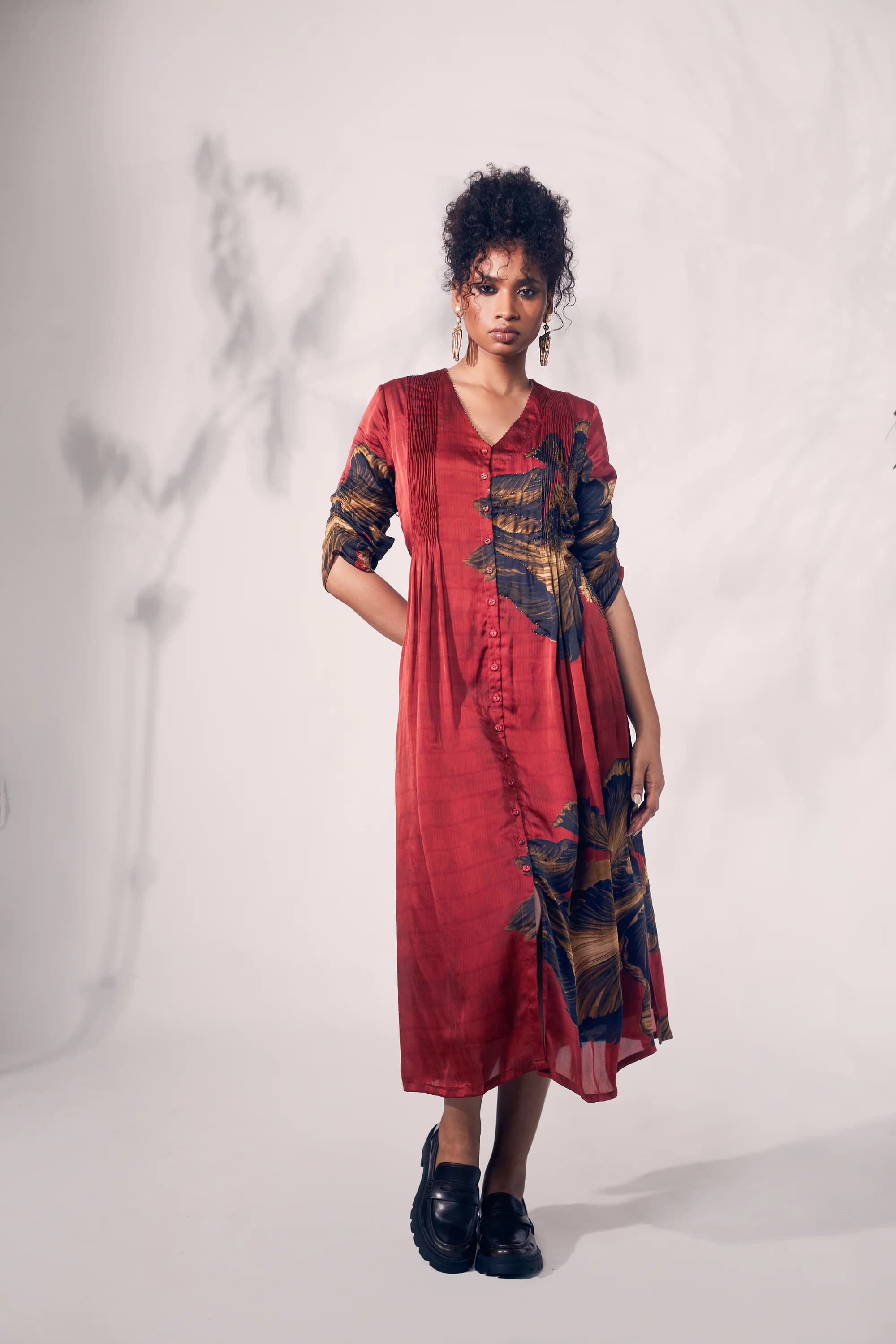 Red Bamboo print with black brown chrysanthemum printed flower.