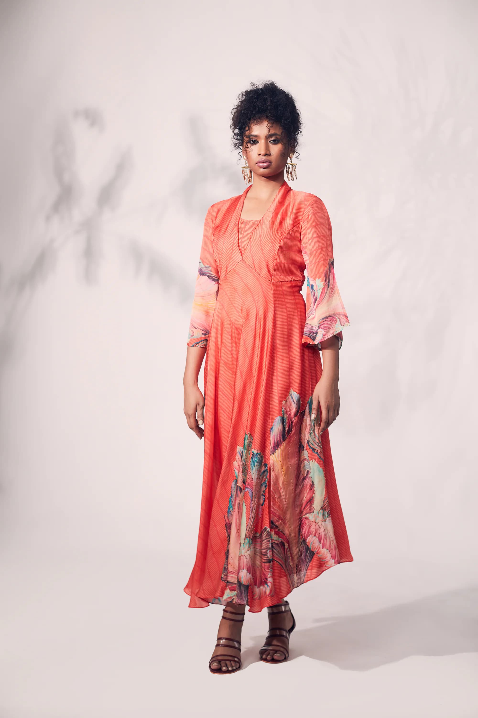 Orange Bamboo print with multicolour chrysanthemum printed flower.