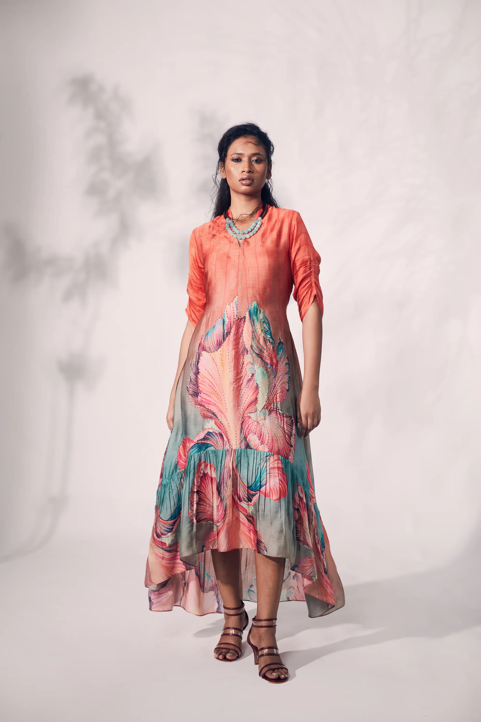 Orange Bamboo print with multicolour chrysanthemum printed flower.